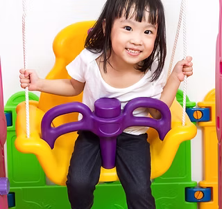 Child working on sensory integration during occupational therapy